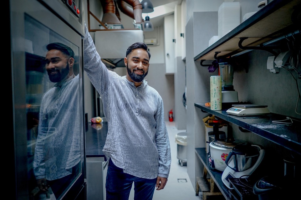 man standing in kitchen